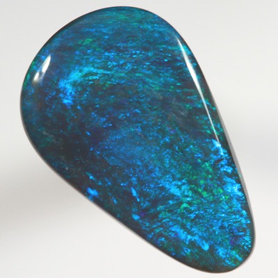 SOLID BLACK OPAL Bright green, turquoise and blue always showing SEE VIDEO